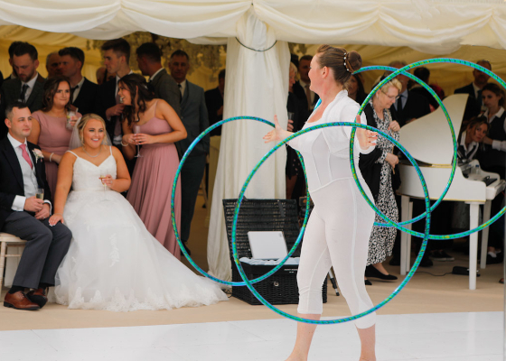 Double hoop by The 2 Lisa's for your event or wedding entertainment.